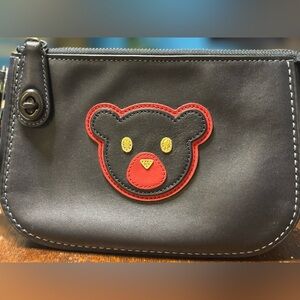 Coach 1941 varsity patch blue turnlock pouch